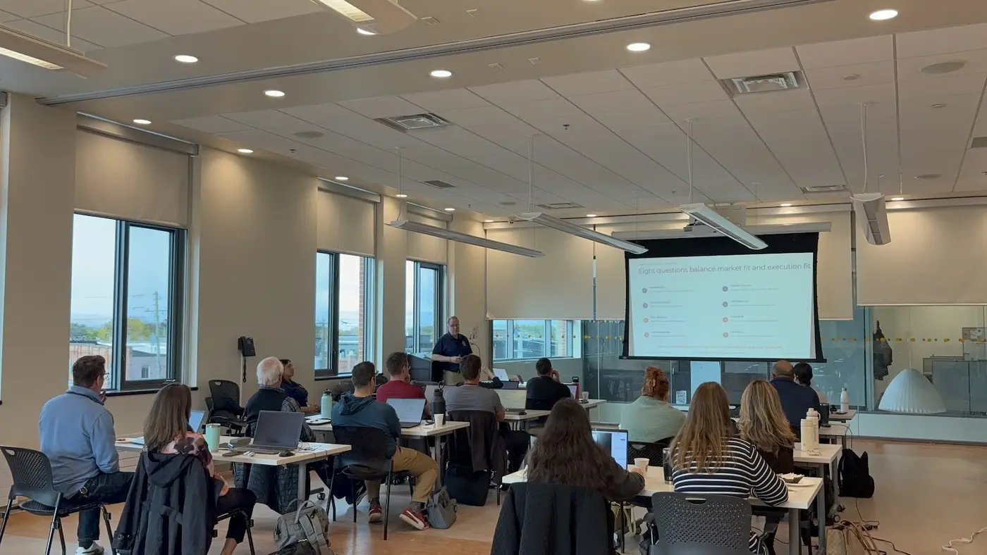 A full room of business owners during a guided build